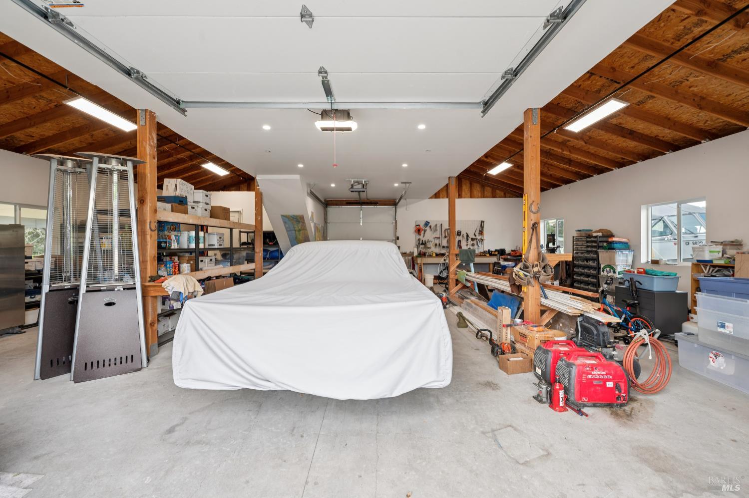 1840-1850 Riebli Road Santa Rosa, CA 95404 - Photo 49 of 71 a living room with lots of furniture and a chandelier