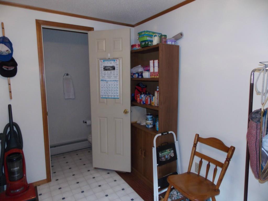 179 Industry Road New Sharon, ME 04955 - Photo 9 of 26 Back door entrance into the Mudroom...