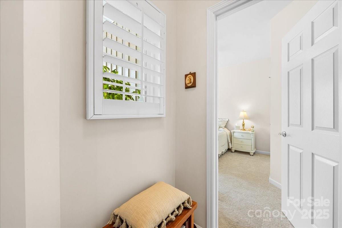 2056 Kennedy Drive Fort Mill, SC 29707 - Photo 12 of 45 a view of a bedroom with a bed and a window