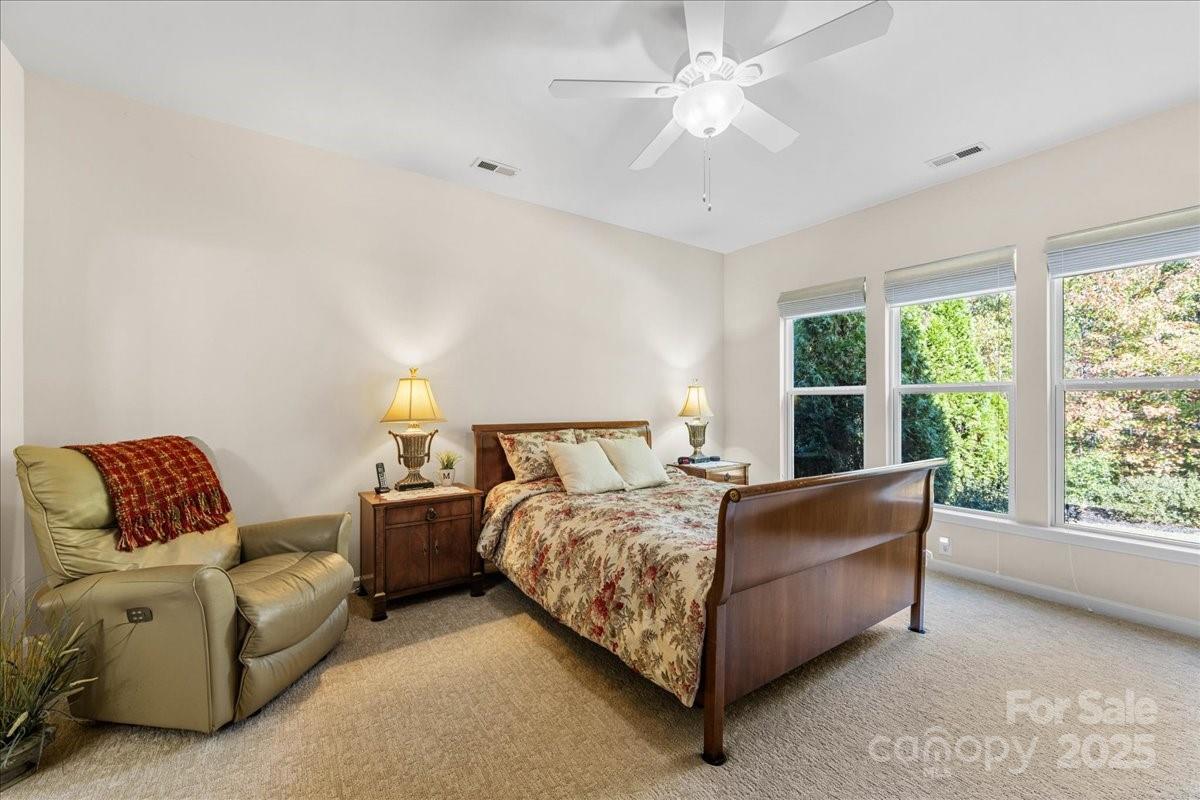 2056 Kennedy Drive Fort Mill, SC 29707 - Photo 28 of 45 a bed room with a bed and a couch