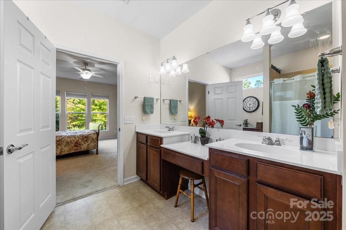 2056 Kennedy Drive Fort Mill, SC 29707 - Photo 29 of 45 a en suite bathroom with a double vanity sink mirror and window