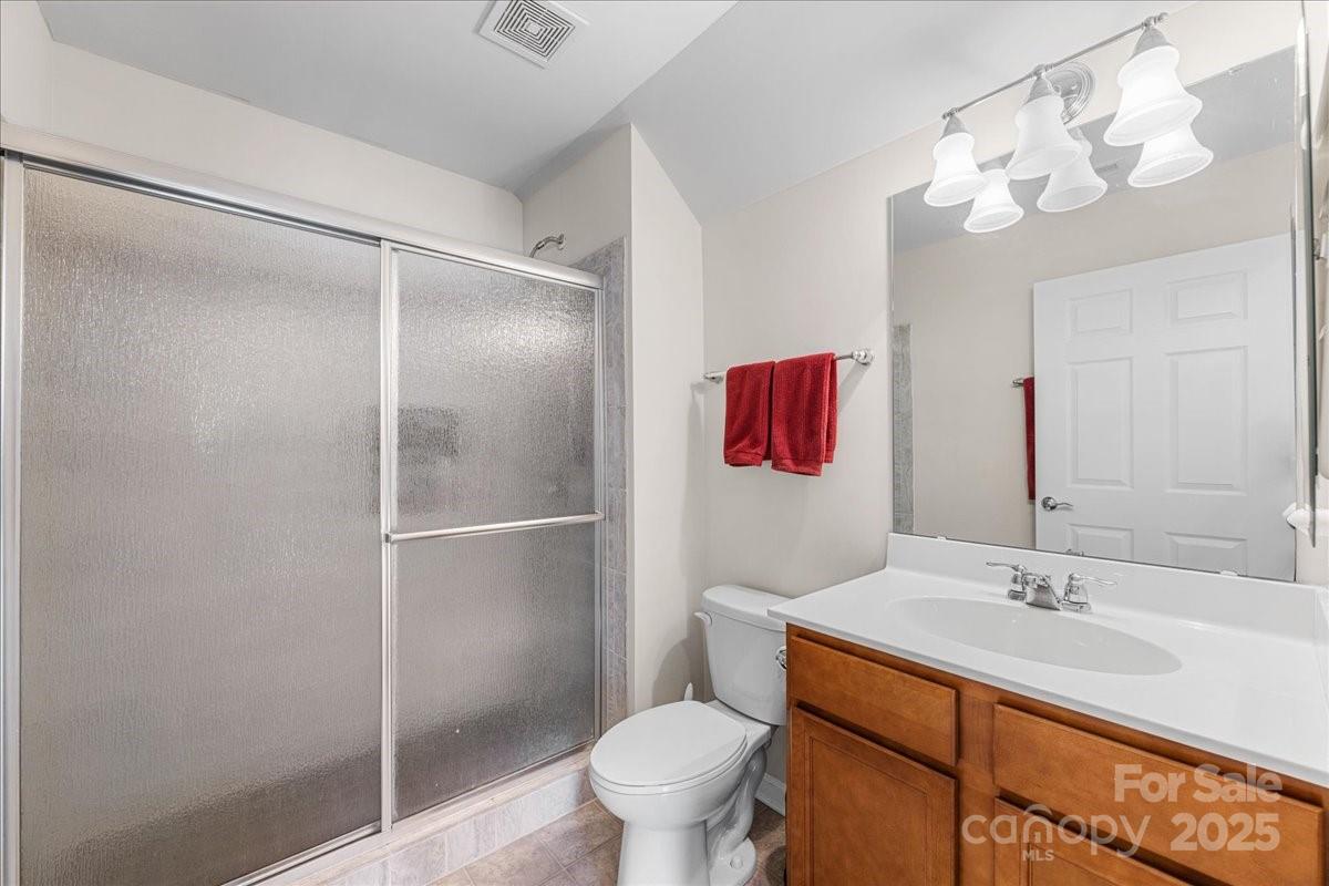 2056 Kennedy Drive Fort Mill, SC 29707 - Photo 33 of 45 a bathroom with a sink toilet and shower