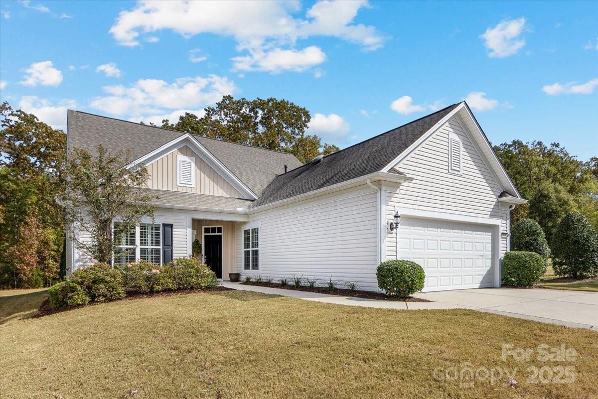 2056 Kennedy Drive Fort Mill, SC 29707 - Photo 4 of 45 a front view of a house with a yard