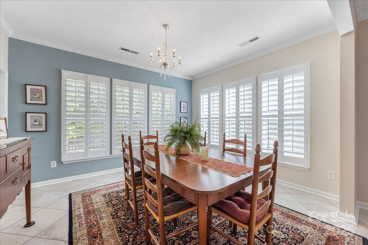 2056 Kennedy Drive Fort Mill, SC 29707 - Photo 9 of 45 a view of a dining room with furniture window and outside view