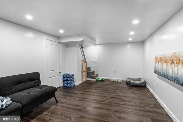 a view of livingroom with furniture and stairs
