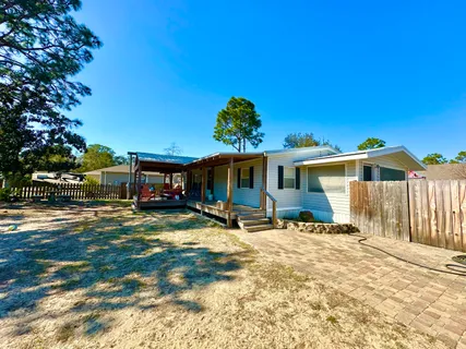 a view of a house with a patio