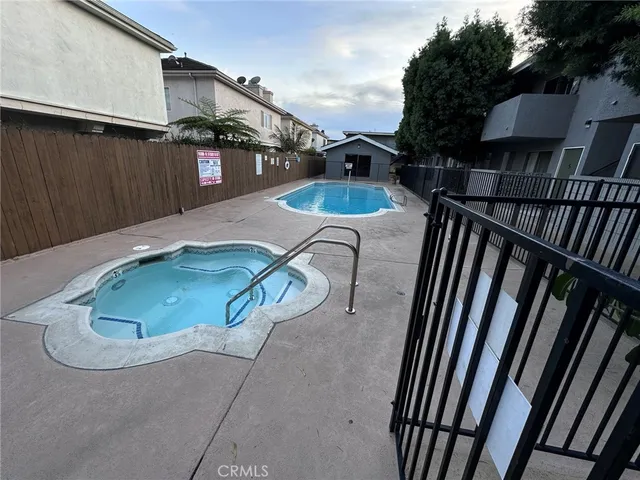a utility room with a sink a washer and dryer