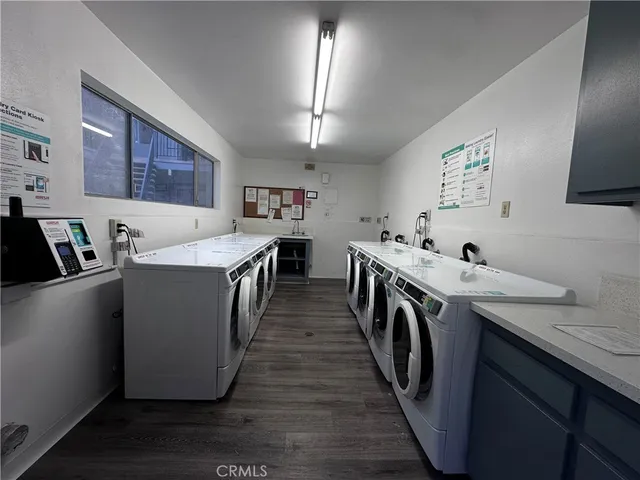 a view of a backyard with sitting area