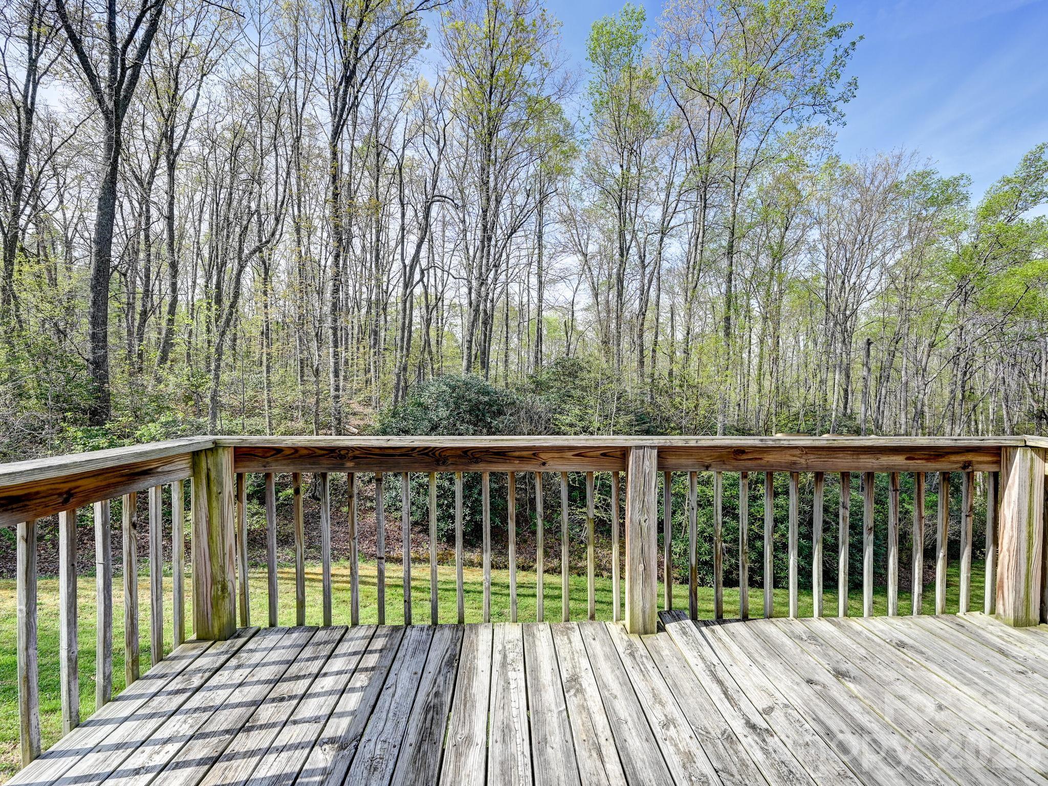 119 Laurel Haven Road Fairview, NC 28730 - Photo 32 of 33 a balcony with wooden floor and fence