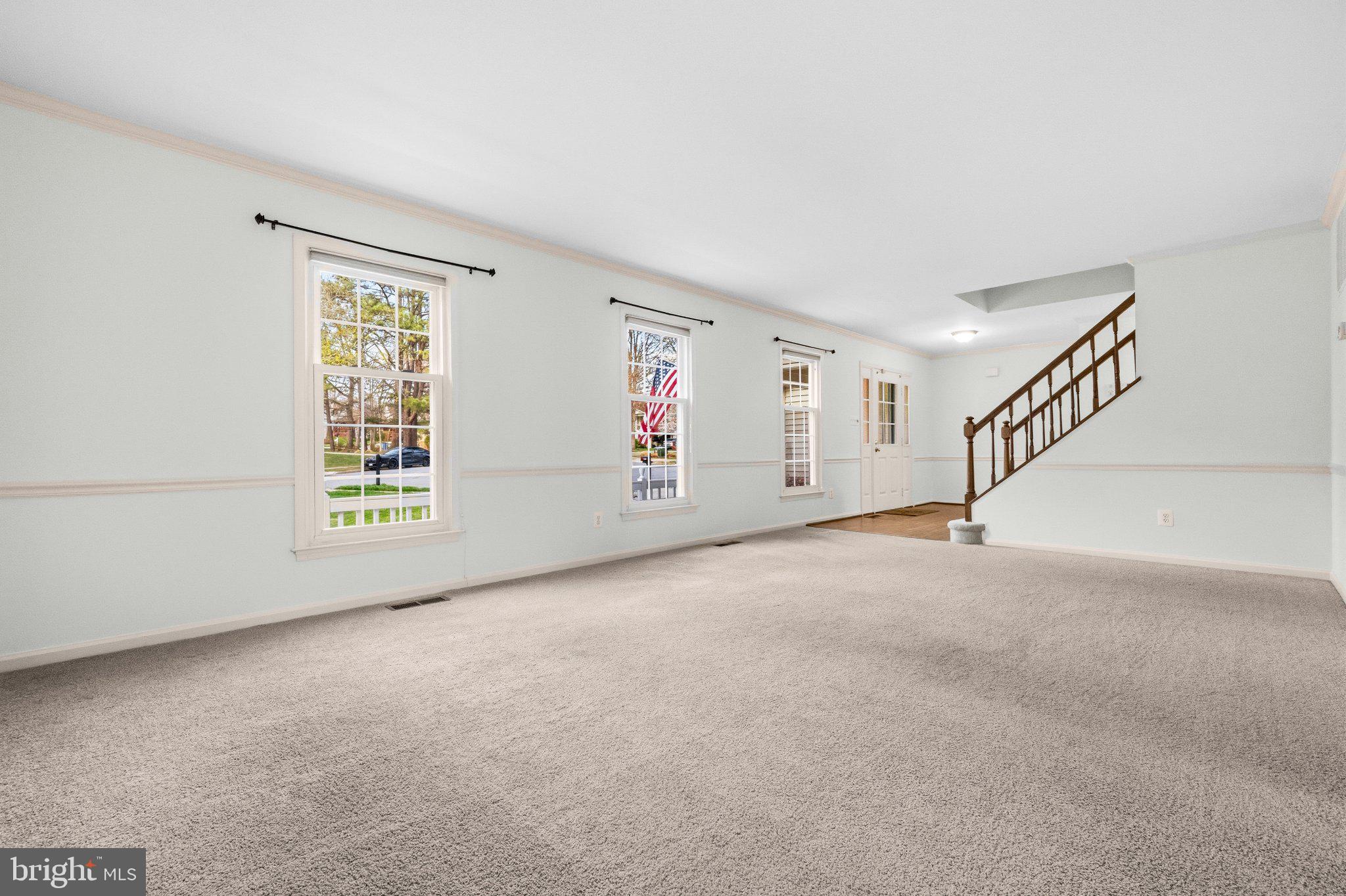 7118 Counter Place Burke, VA 22015 - Photo 11 of 53 Spacious, light-filled living area.