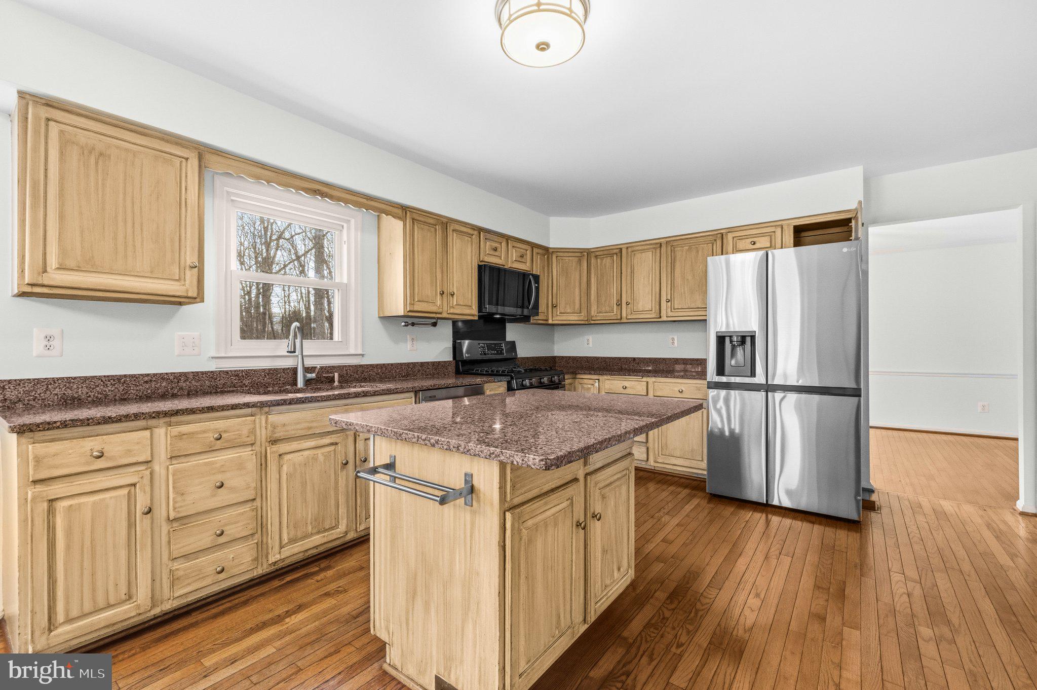 7118 Counter Place Burke, VA 22015 - Photo 15 of 53 Bright and inviting kitchen space.