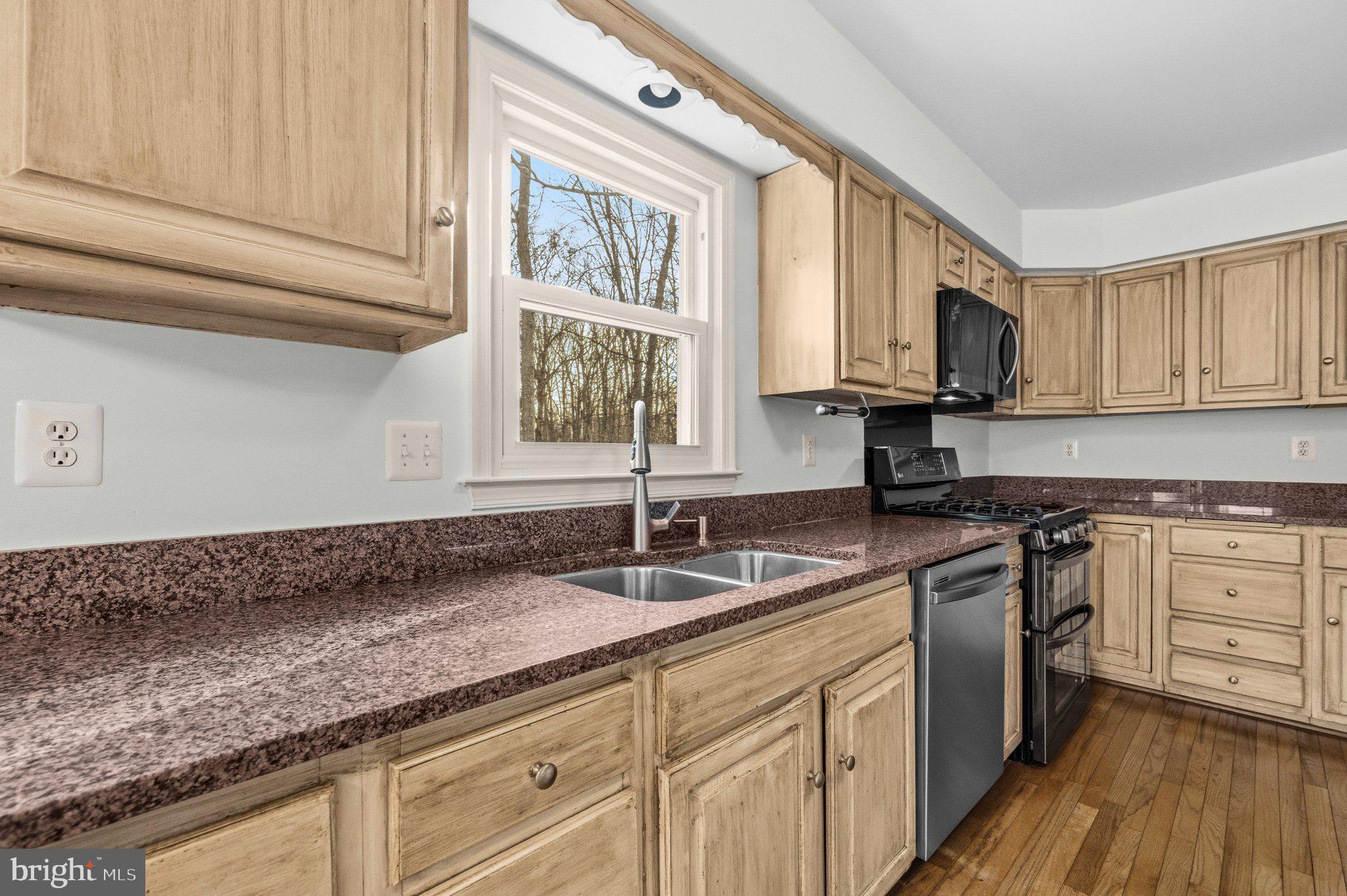 7118 Counter Place Burke, VA 22015 - Photo 17 of 53 Bright kitchen with natural light.