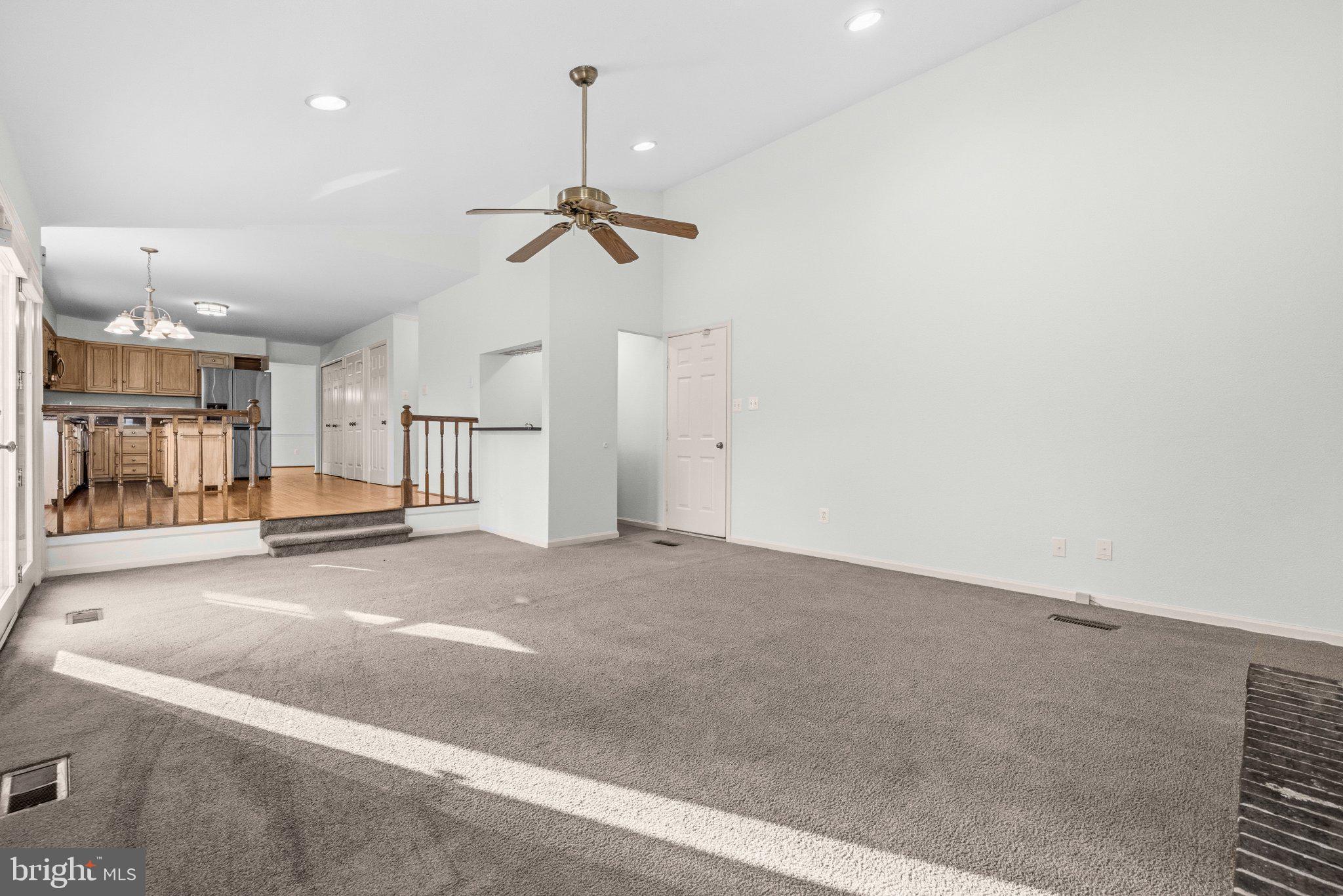 7118 Counter Place Burke, VA 22015 - Photo 20 of 53 Spacious living area with natural light.