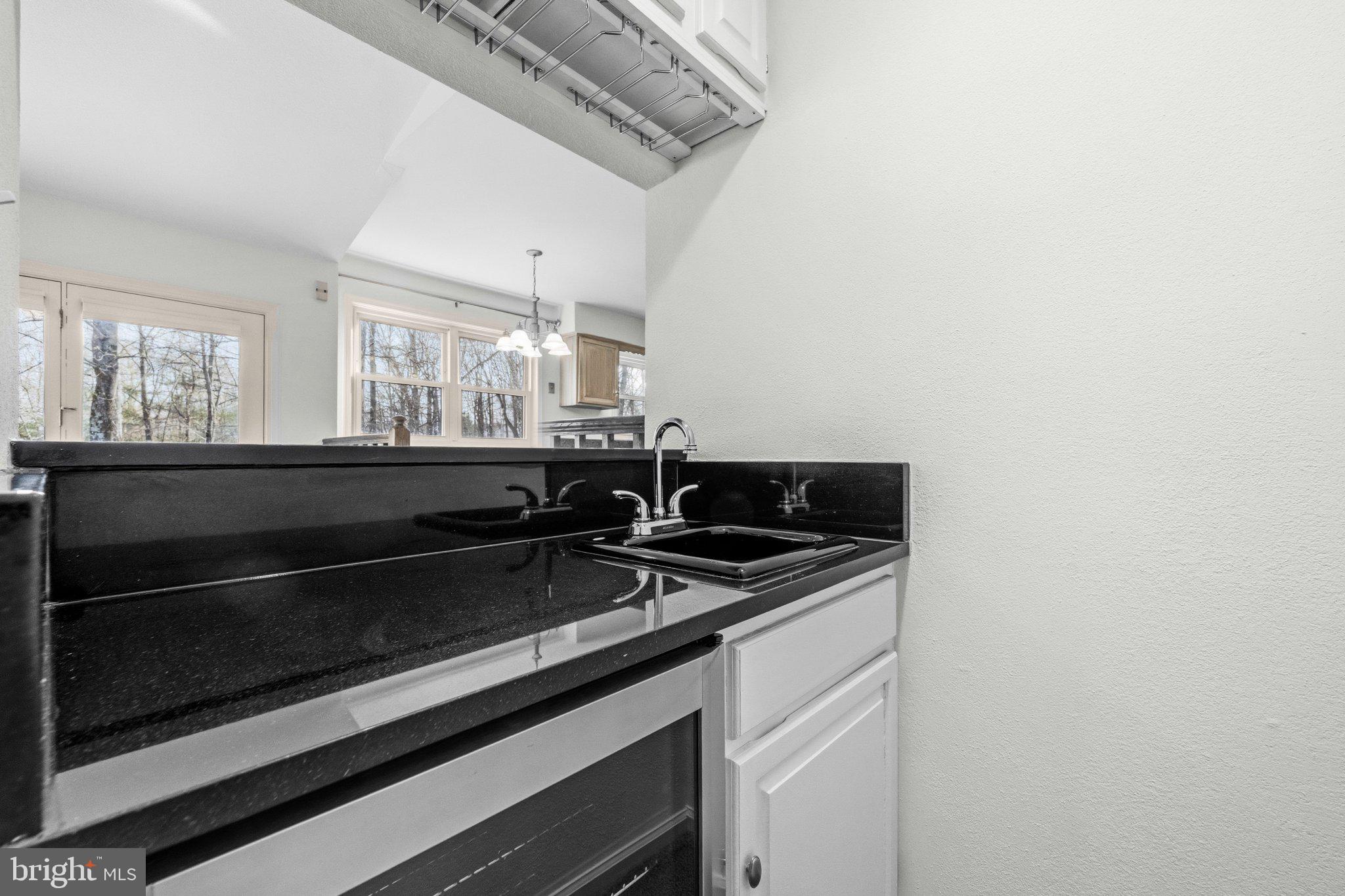 7118 Counter Place Burke, VA 22015 - Photo 22 of 53 Sleek kitchen with modern finishes.