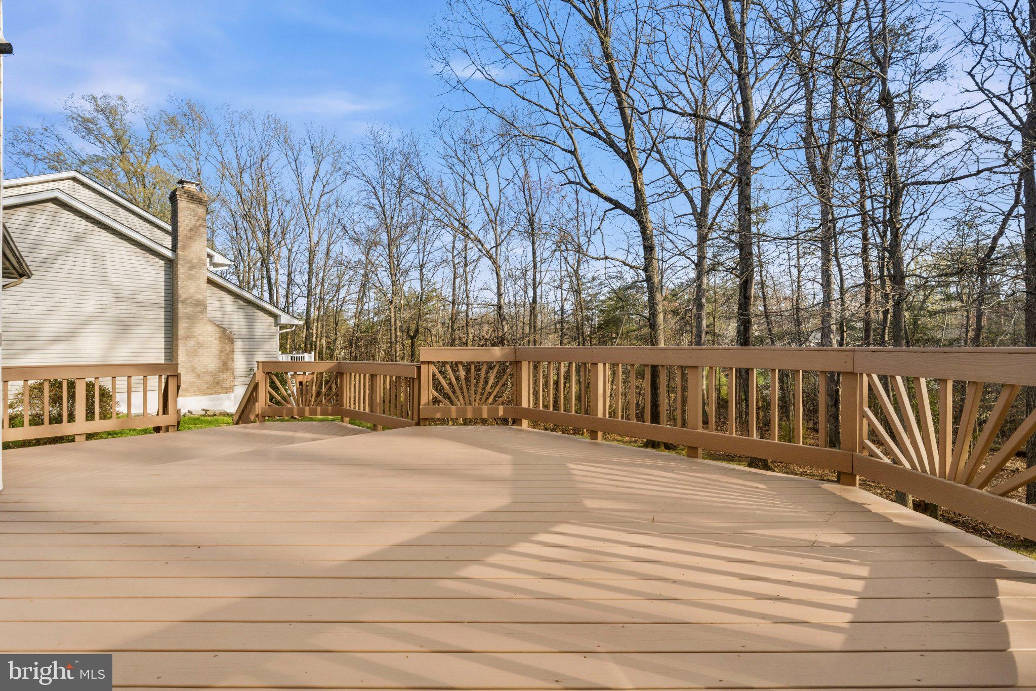 7118 Counter Place Burke, VA 22015 - Photo 24 of 53 Serene deck with wooded backdrop.
