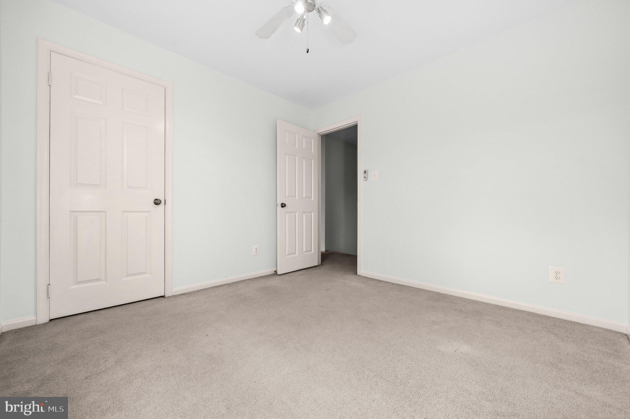 7118 Counter Place Burke, VA 22015 - Photo 27 of 53 Spacious room with soft, neutral tones.