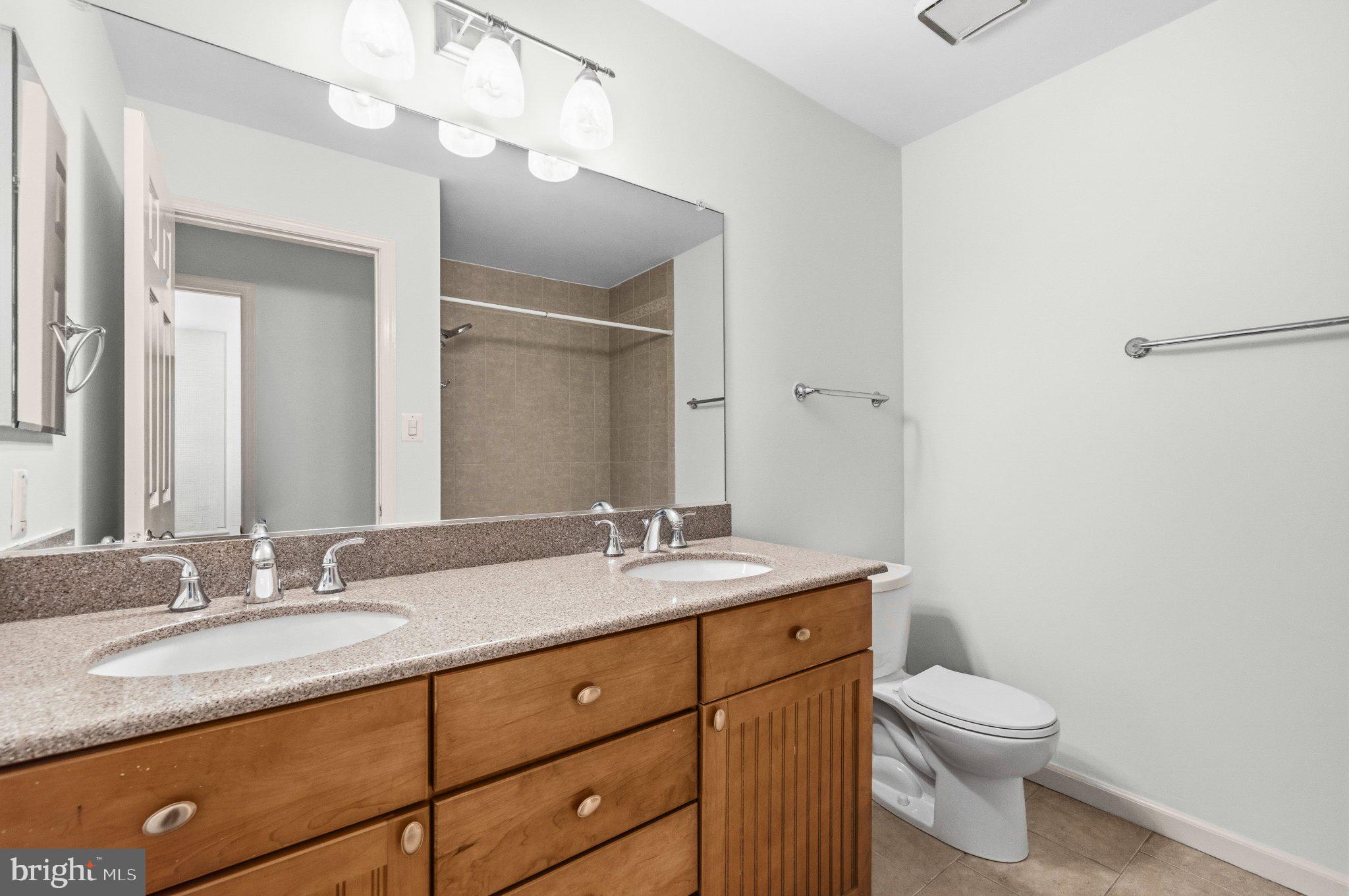 7118 Counter Place Burke, VA 22015 - Photo 28 of 53 Spacious bathroom with modern finishes.
