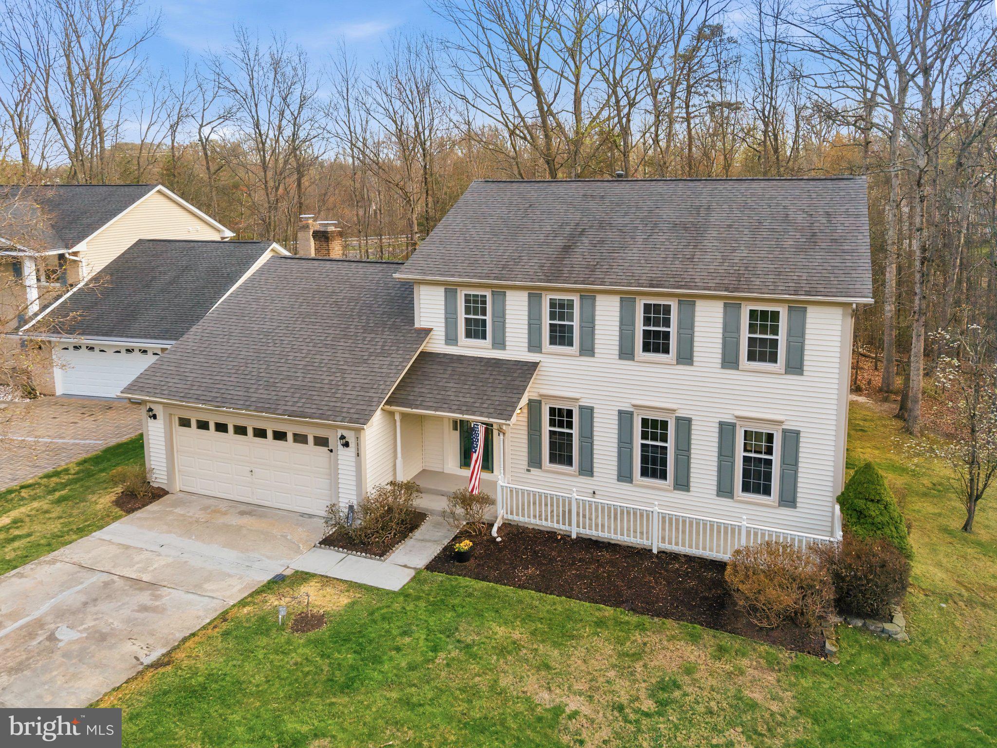 7118 Counter Place Burke, VA 22015 - Photo 3 of 53 Charming home nestled in nature's embrace.