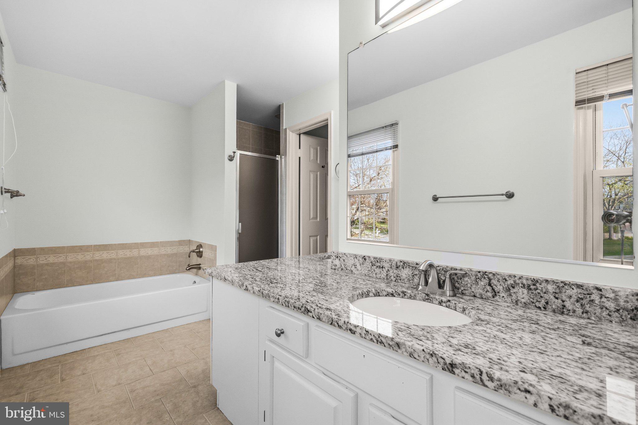 7118 Counter Place Burke, VA 22015 - Photo 37 of 53 Modern bathroom with natural light.