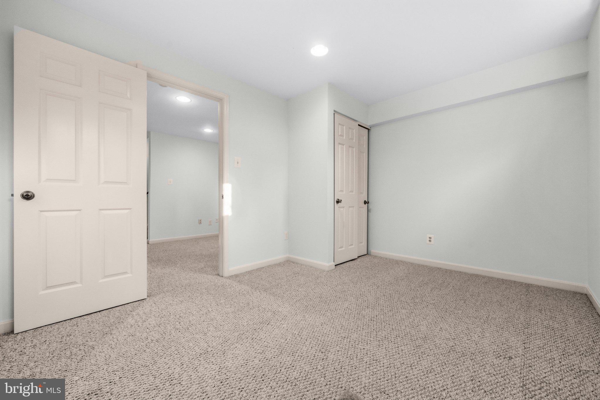 7118 Counter Place Burke, VA 22015 - Photo 39 of 53 Spacious room with soft, neutral tones.