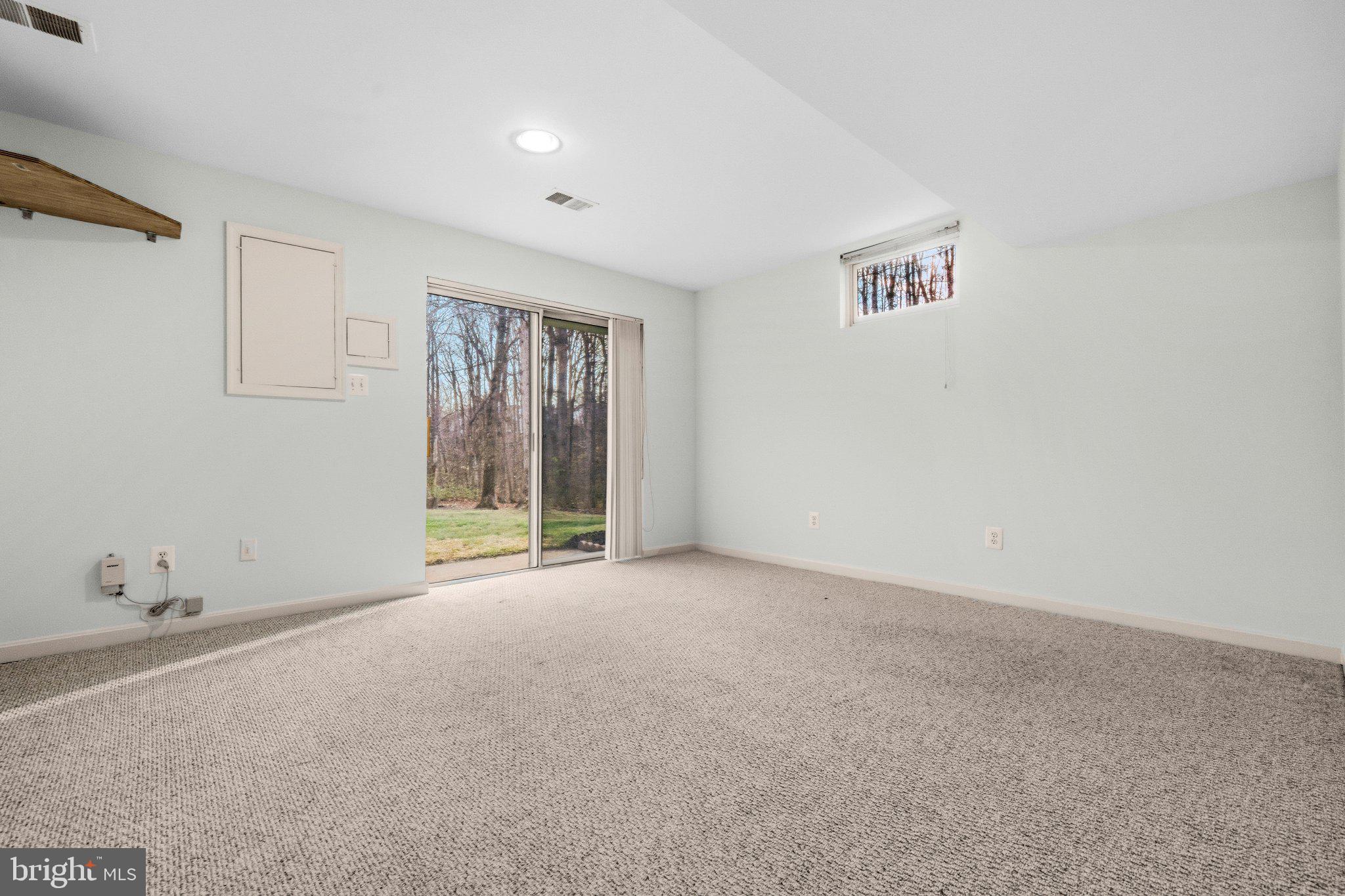 7118 Counter Place Burke, VA 22015 - Photo 41 of 53 Bright, airy space with nature views.