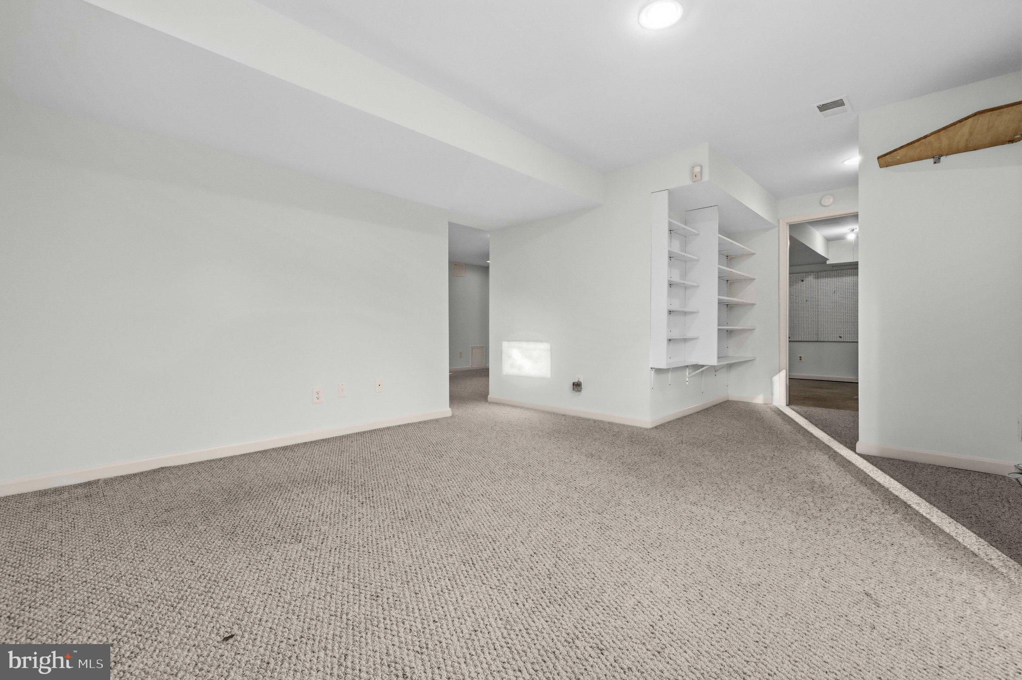 7118 Counter Place Burke, VA 22015 - Photo 42 of 53 Spacious, versatile living area awaits.