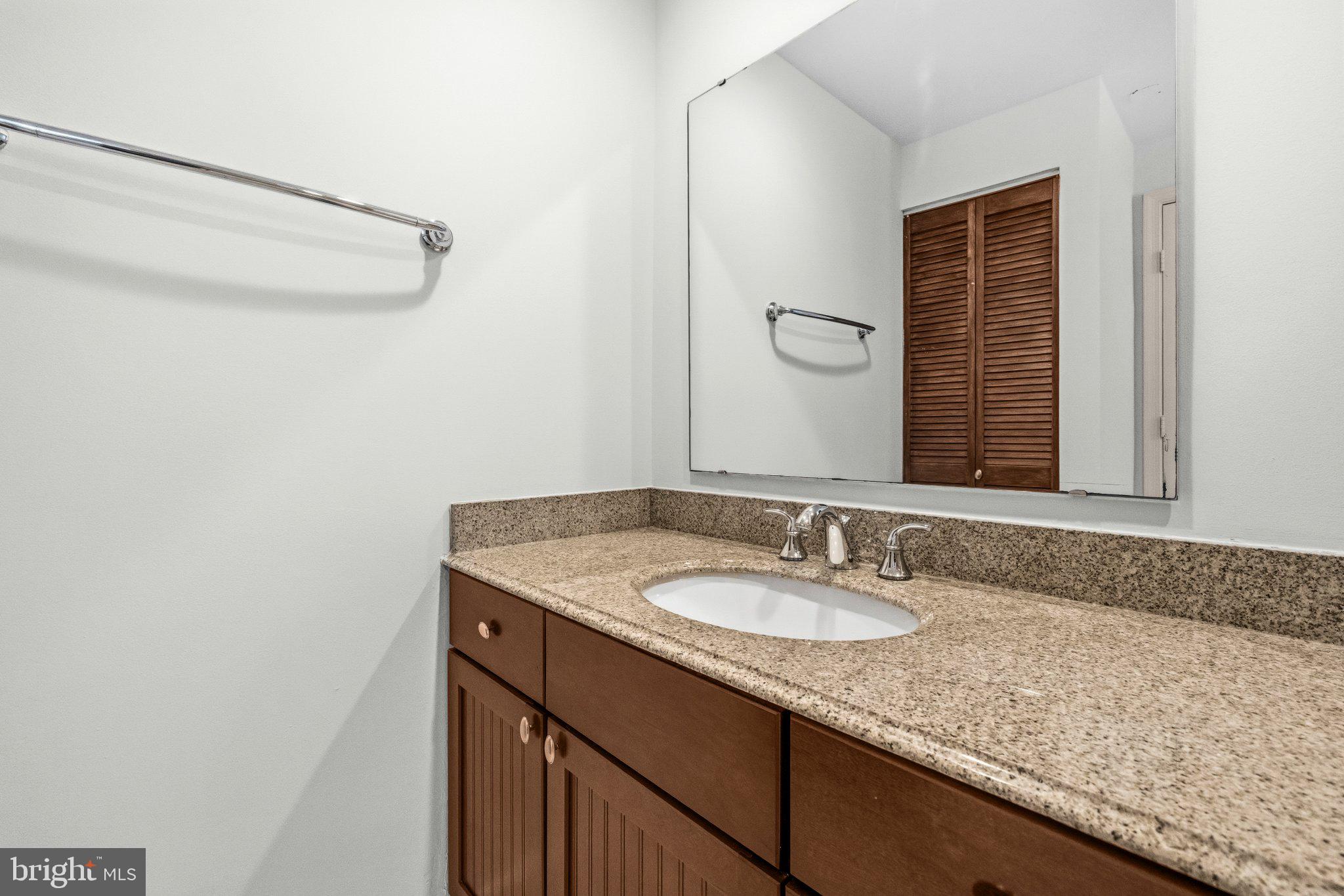 7118 Counter Place Burke, VA 22015 - Photo 44 of 53 Sleek bathroom with modern finishes.