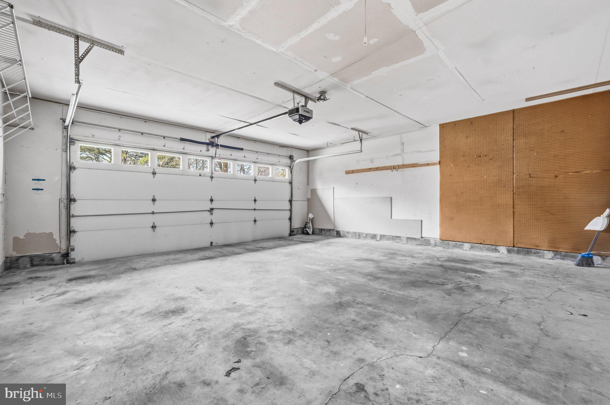 7118 Counter Place Burke, VA 22015 - Photo 46 of 53 Spacious garage with natural light.