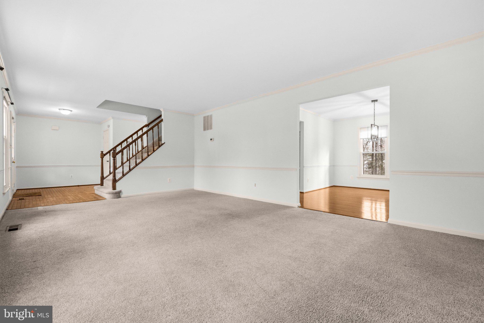 7118 Counter Place Burke, VA 22015 - Photo 10 of 53 Spacious, light-filled living area.