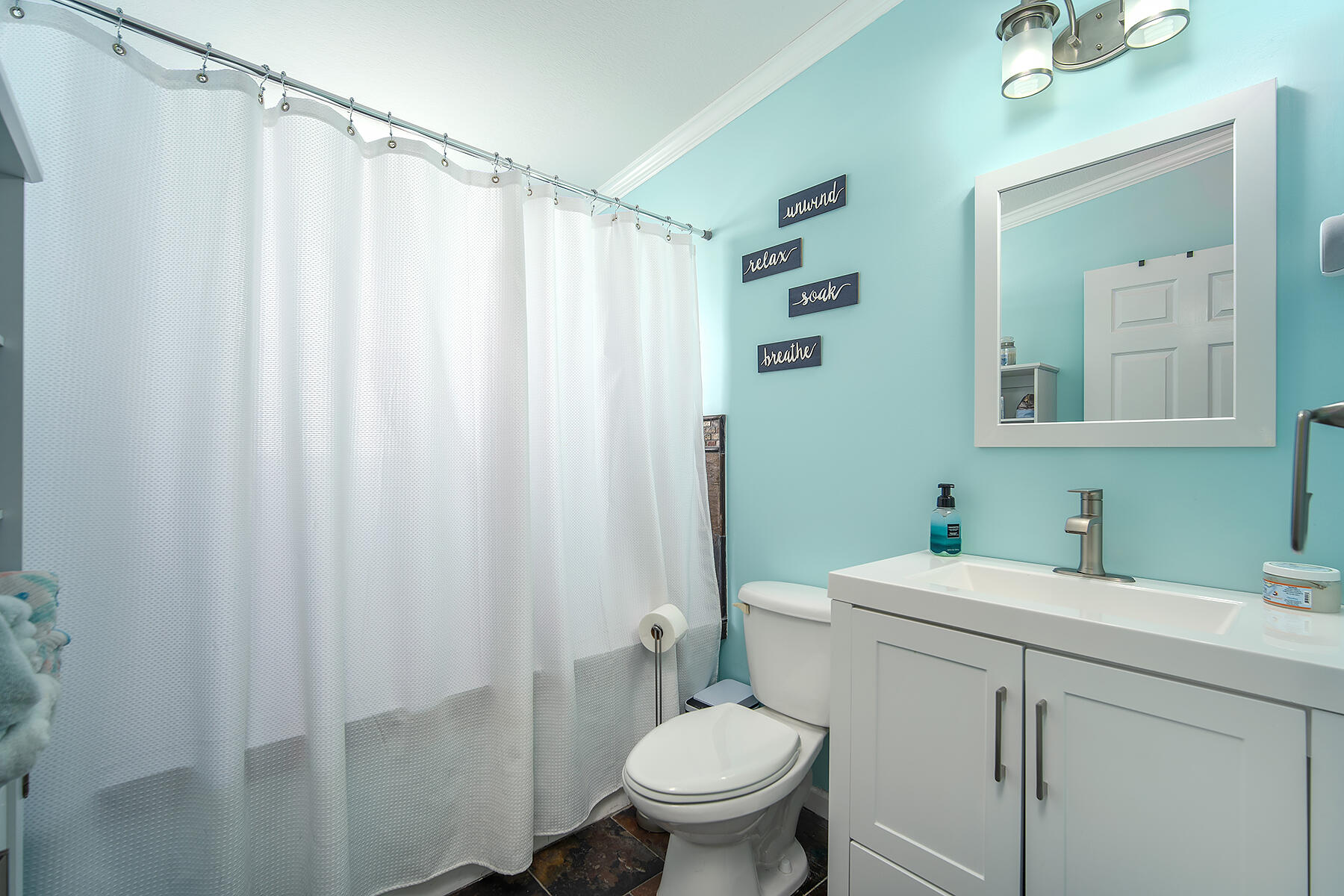 10 Riviera Drive Key West, FL 33040 - Photo 20 of 49 a bathroom with a sink a toilet and shower