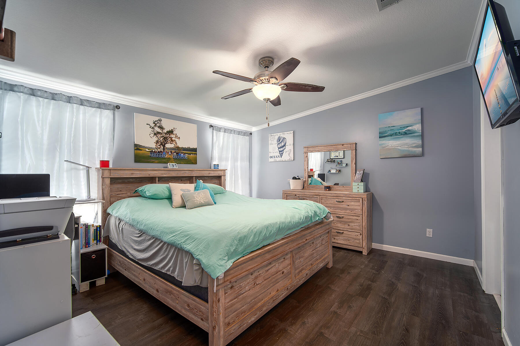 10 Riviera Drive Key West, FL 33040 - Photo 25 of 49 a bedroom with a bed and a chandelier