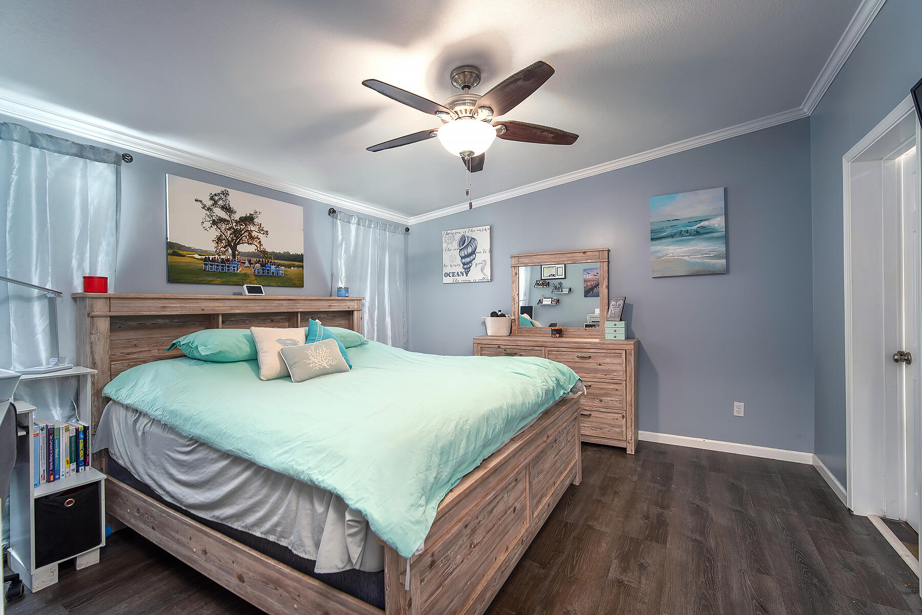 10 Riviera Drive Key West, FL 33040 - Photo 26 of 49 a bedroom with a bed and a chandelier