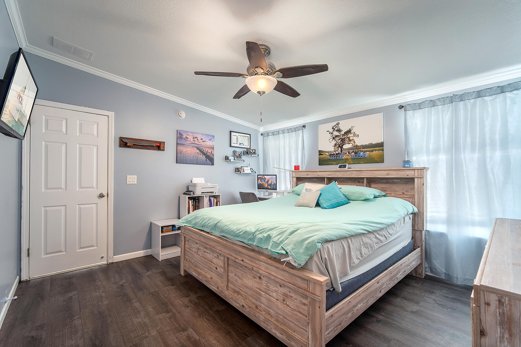 10 Riviera Drive Key West, FL 33040 - Photo 27 of 49 a bedroom with a bed and a chandelier