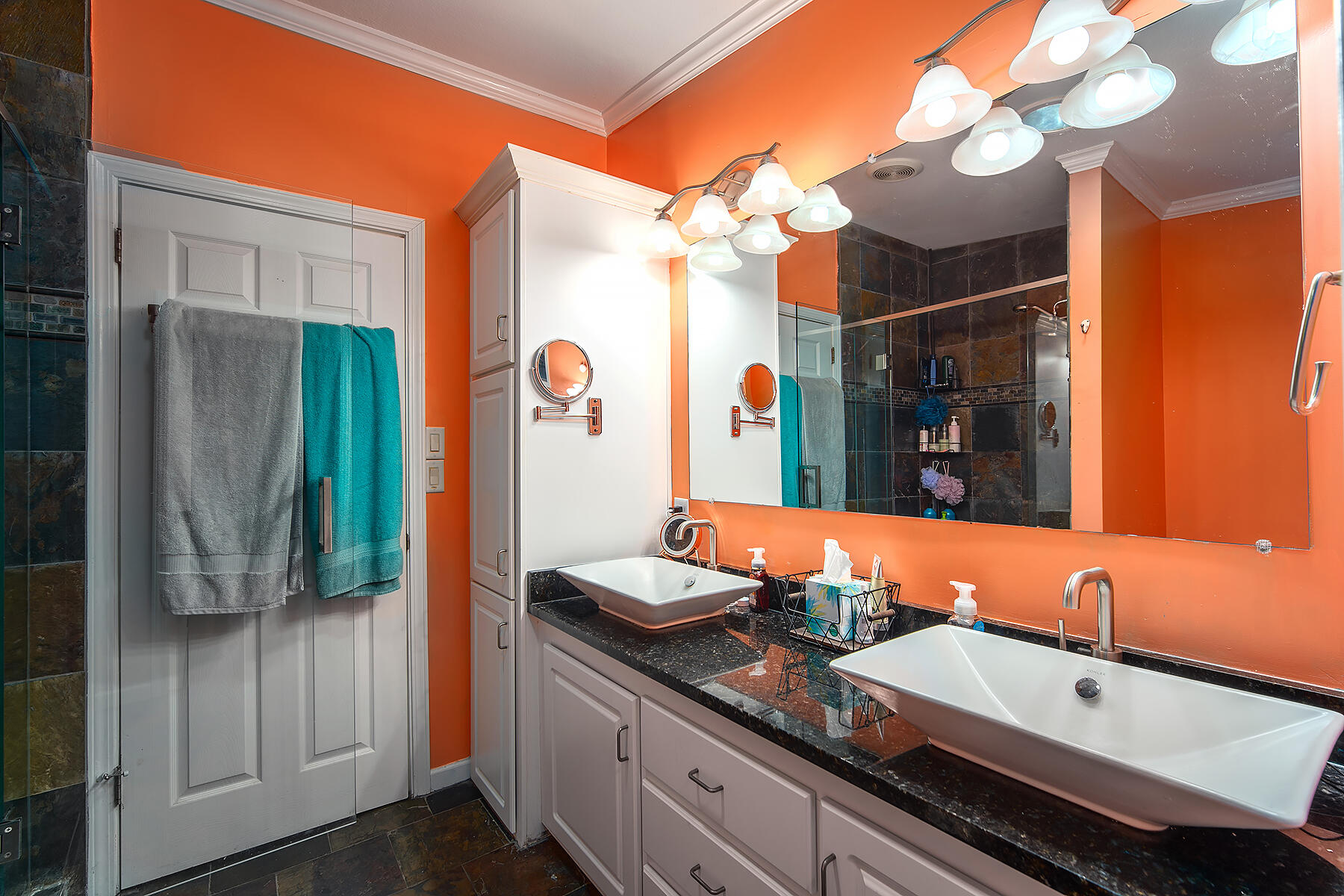 10 Riviera Drive Key West, FL 33040 - Photo 32 of 49 a bathroom with a granite countertop sink and a mirror