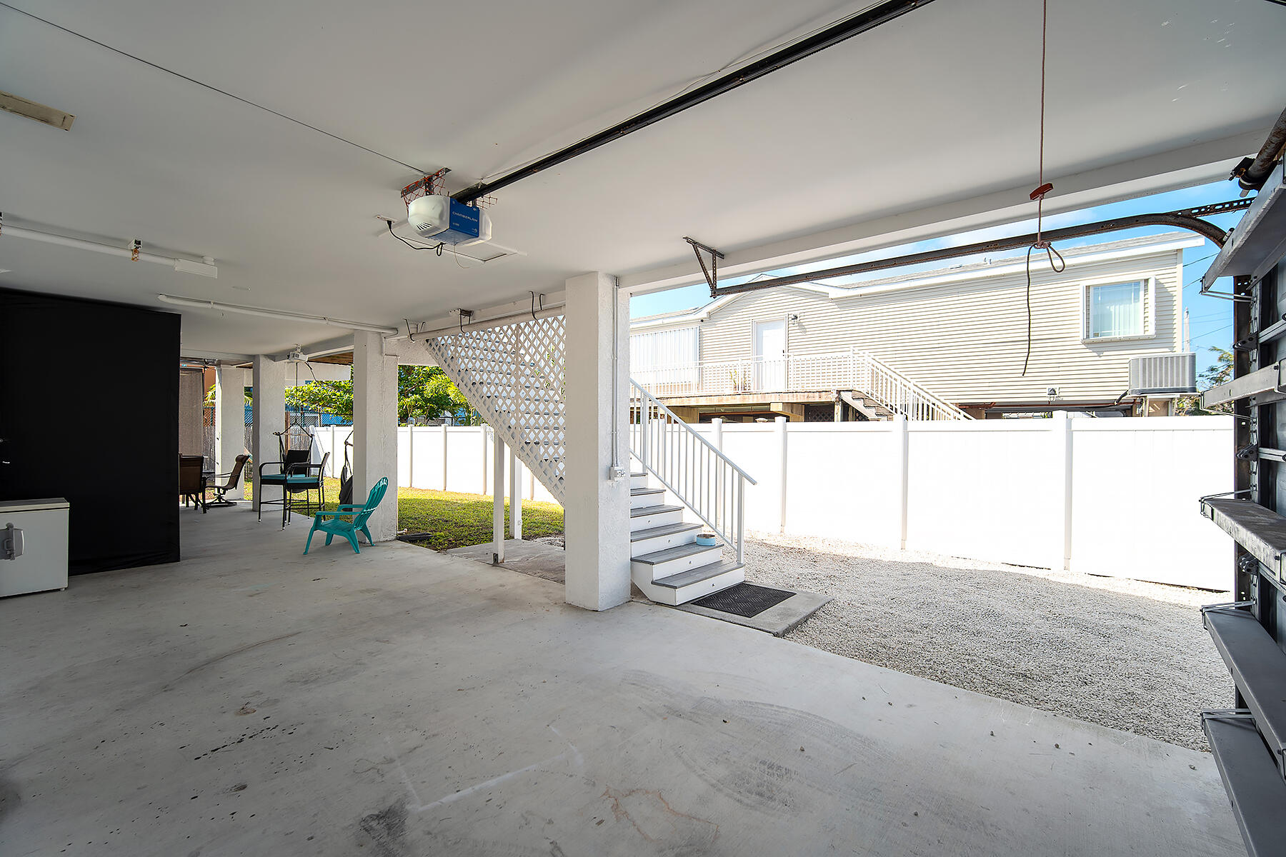 10 Riviera Drive Key West, FL 33040 - Photo 35 of 49 a view of a livingroom with hardwood floor and a ceiling fan