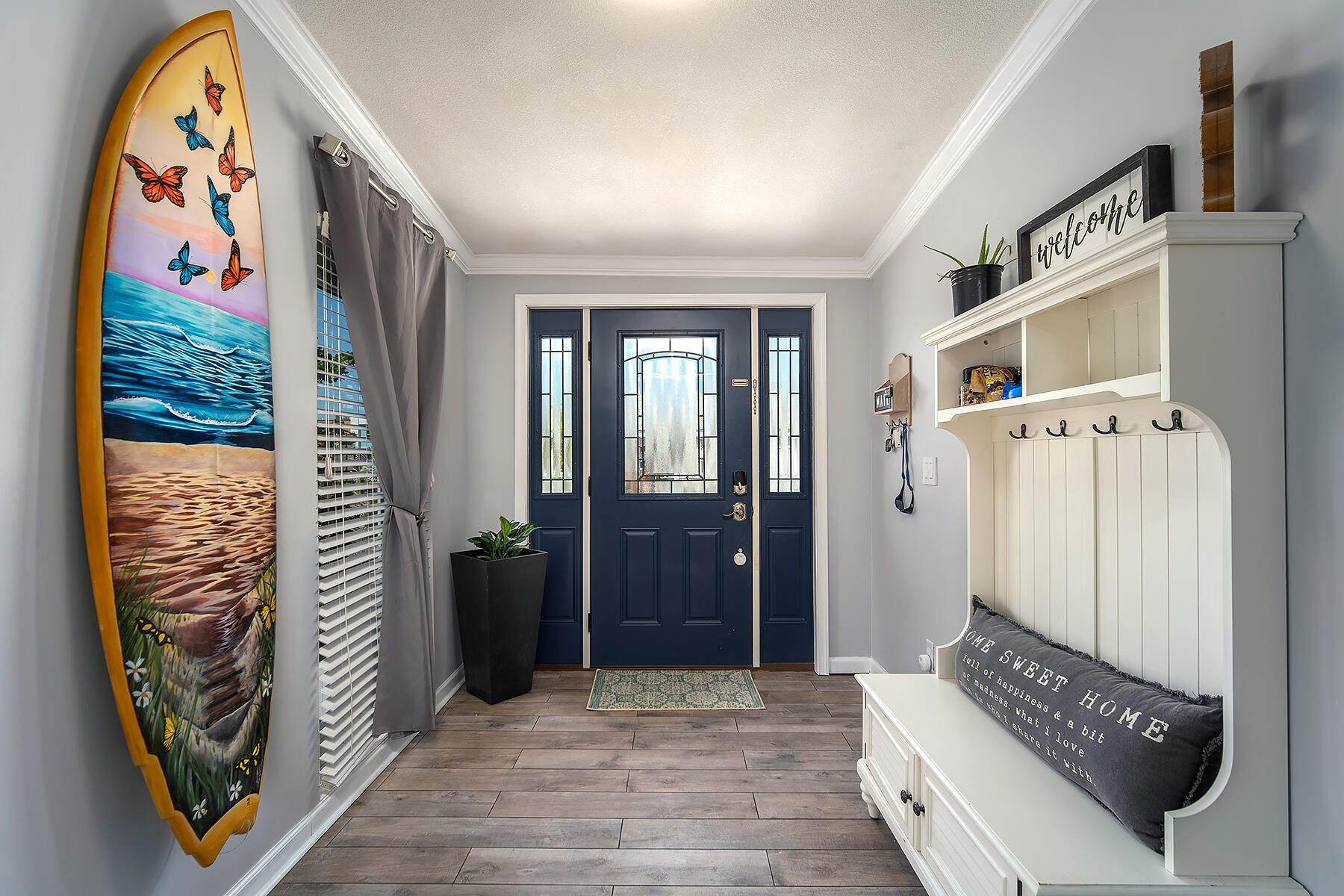 10 Riviera Drive Key West, FL 33040 - Photo 5 of 49 a view of an entryway with wooden floor