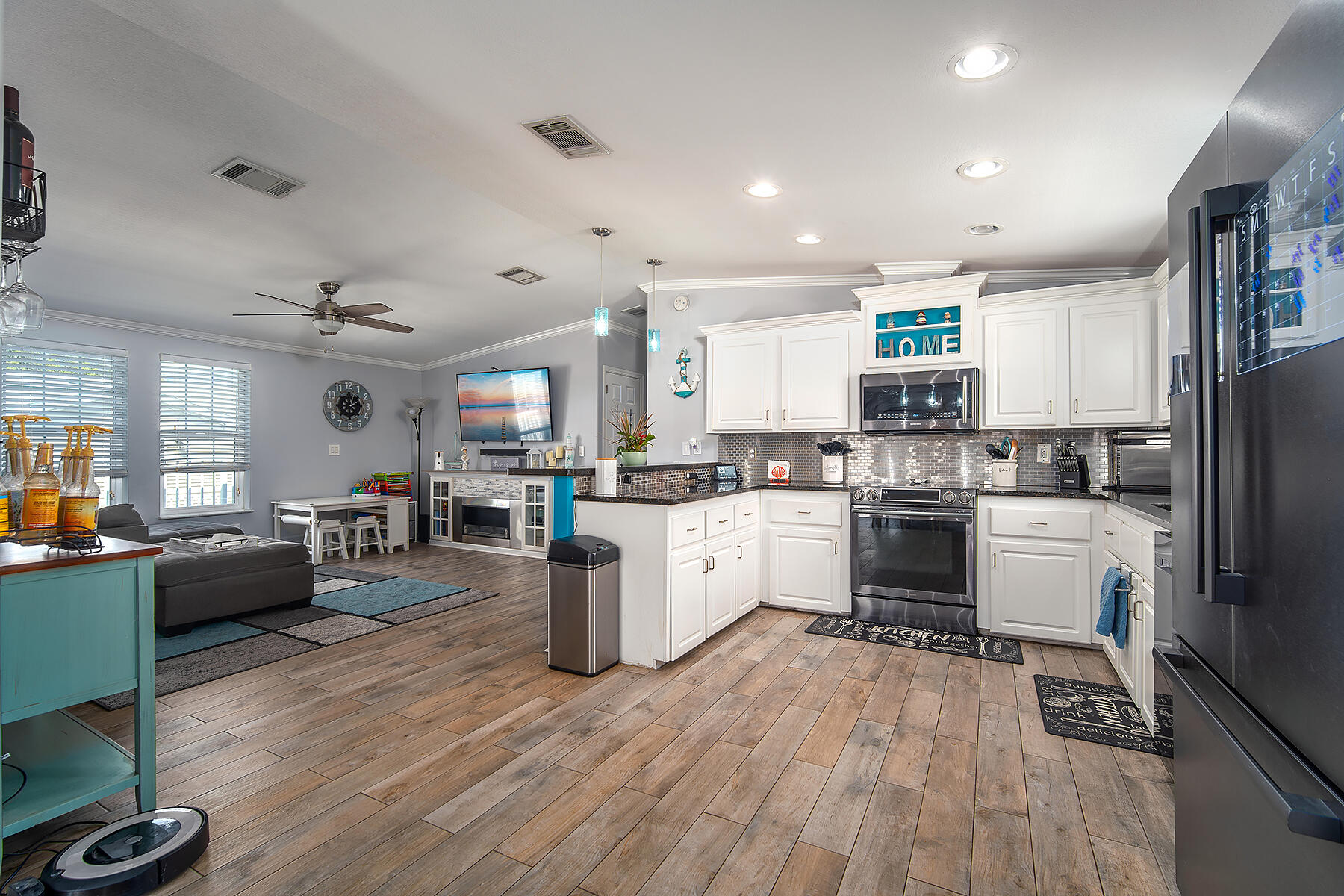 10 Riviera Drive Key West, FL 33040 - Photo 10 of 49 a kitchen with counter top space a sink appliances and cabinets