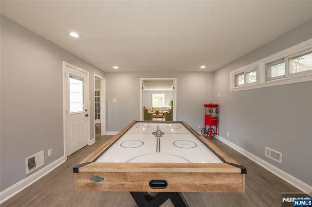 a view of a hallway with windows