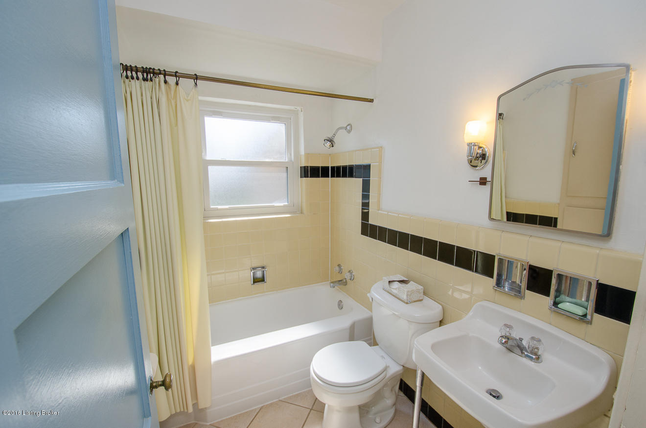 2510 Alanmede Road Louisville, KY 40205 - Photo 16 of 28 The bath is located adjacent to all three bedrooms.