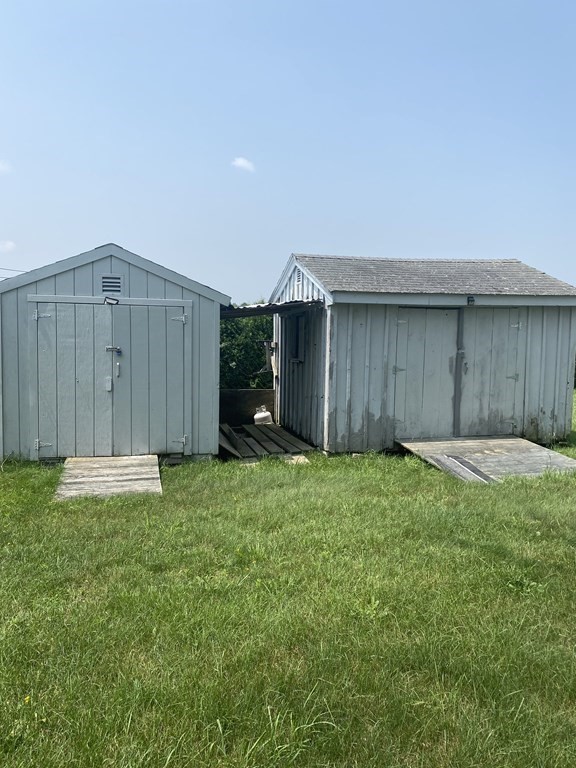 1039 Main Street Acushnet, MA 02743 - Photo 16 of 22 a view of backyard with kitchen island