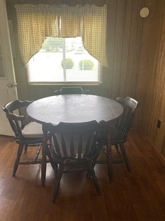1039 Main Street Acushnet, MA 02743 - Photo 6 of 22 a table with chairs and window
