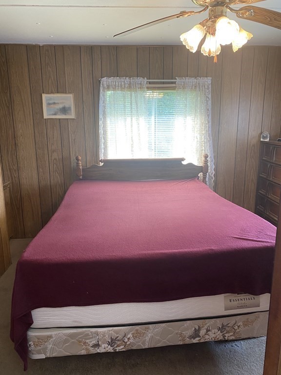 1039 Main Street Acushnet, MA 02743 - Photo 7 of 22 a bedroom with a bed and window