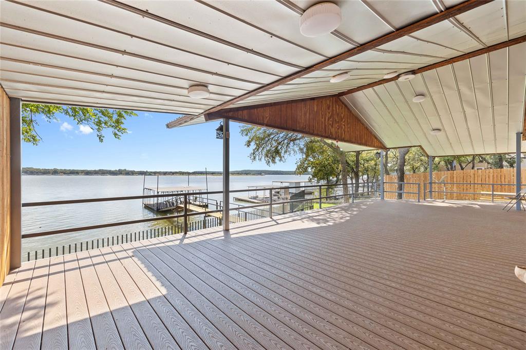 4010 Seneca Circle May, TX 76857 - Photo 14 of 30 a view of a balcony with wooden floor