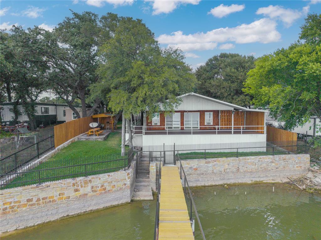 4010 Seneca Circle May, TX 76857 - Photo 2 of 30 a front view of a house with a yard