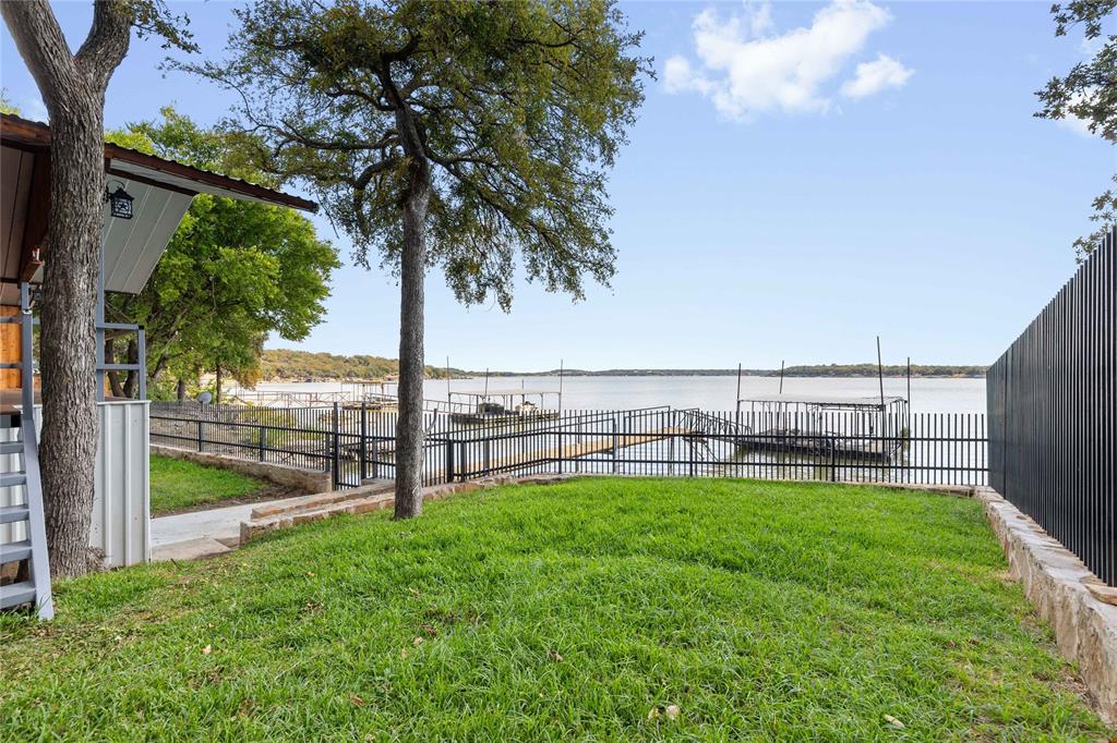 4010 Seneca Circle May, TX 76857 - Photo 10 of 30 a view of a patio with a garden