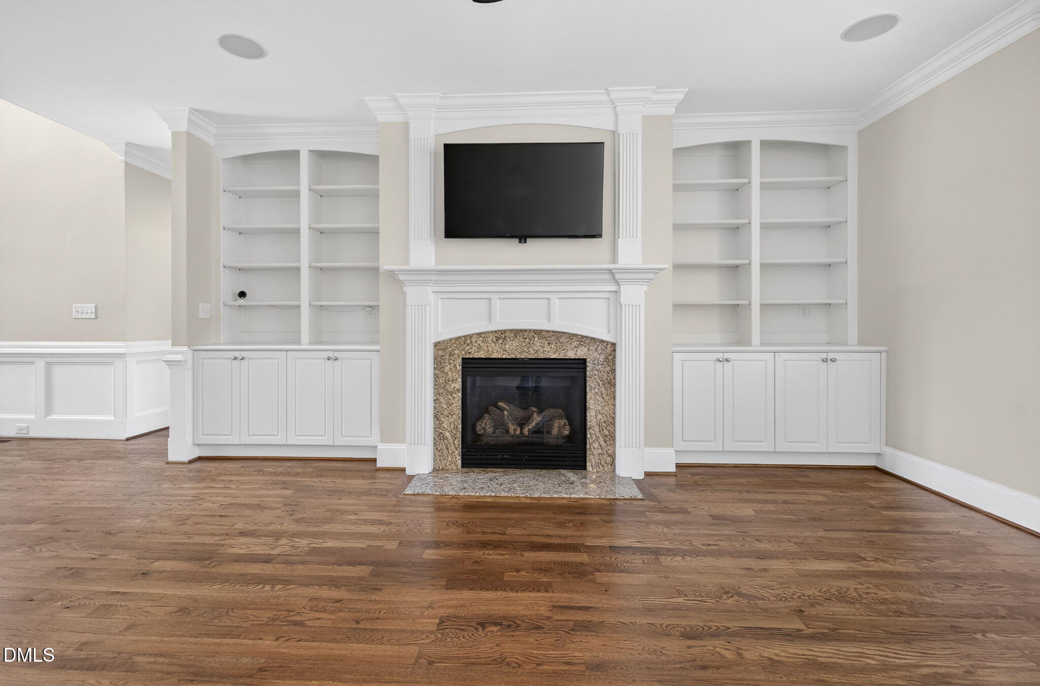 2700 Eastern Star Circle Rolesville, NC 27571 - Photo 16 of 75 a living room with a fireplace and a flat screen tv
