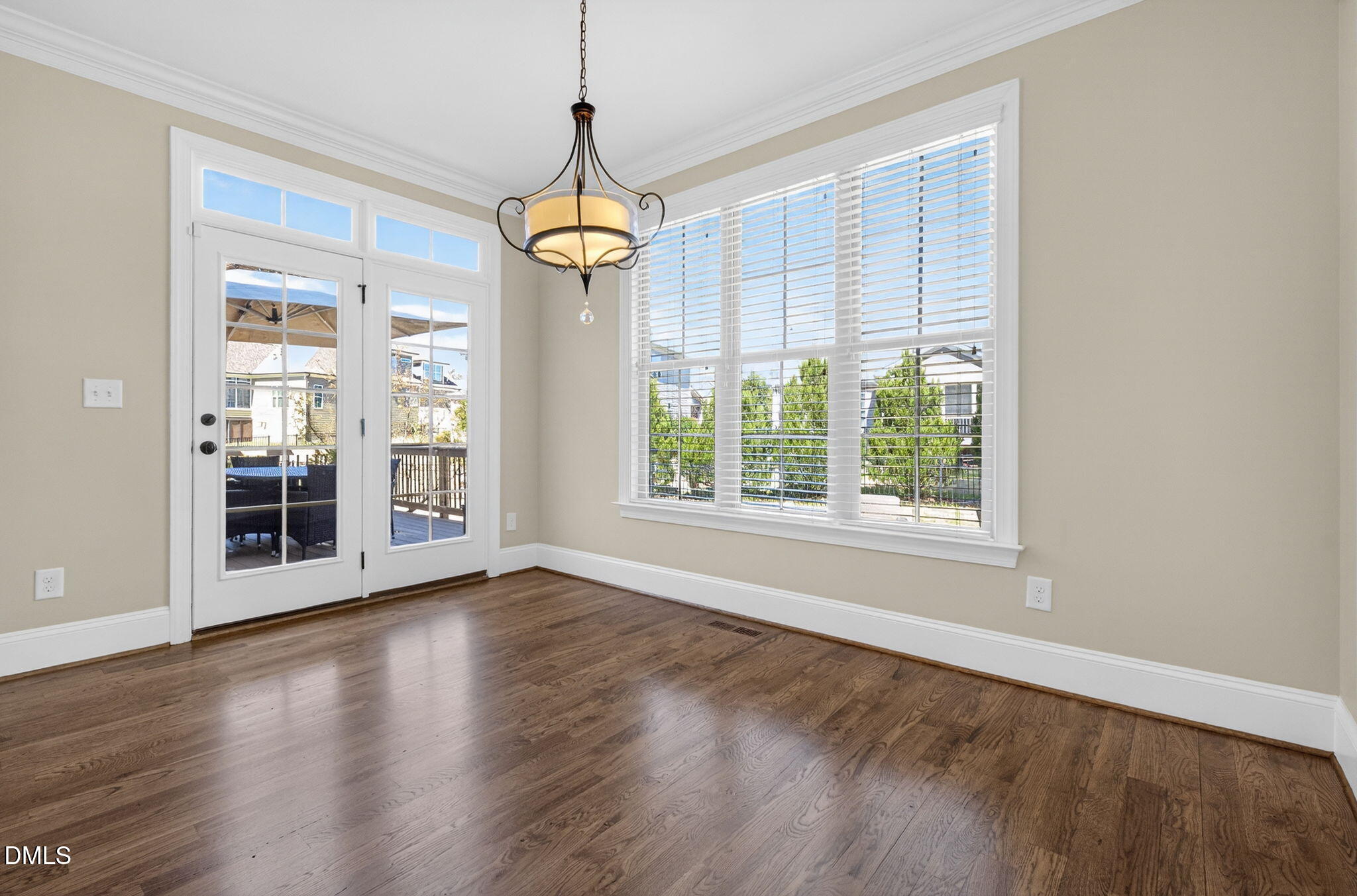 2700 Eastern Star Circle Rolesville, NC 27571 - Photo 19 of 75 a view of an empty room with wooden floor and a window