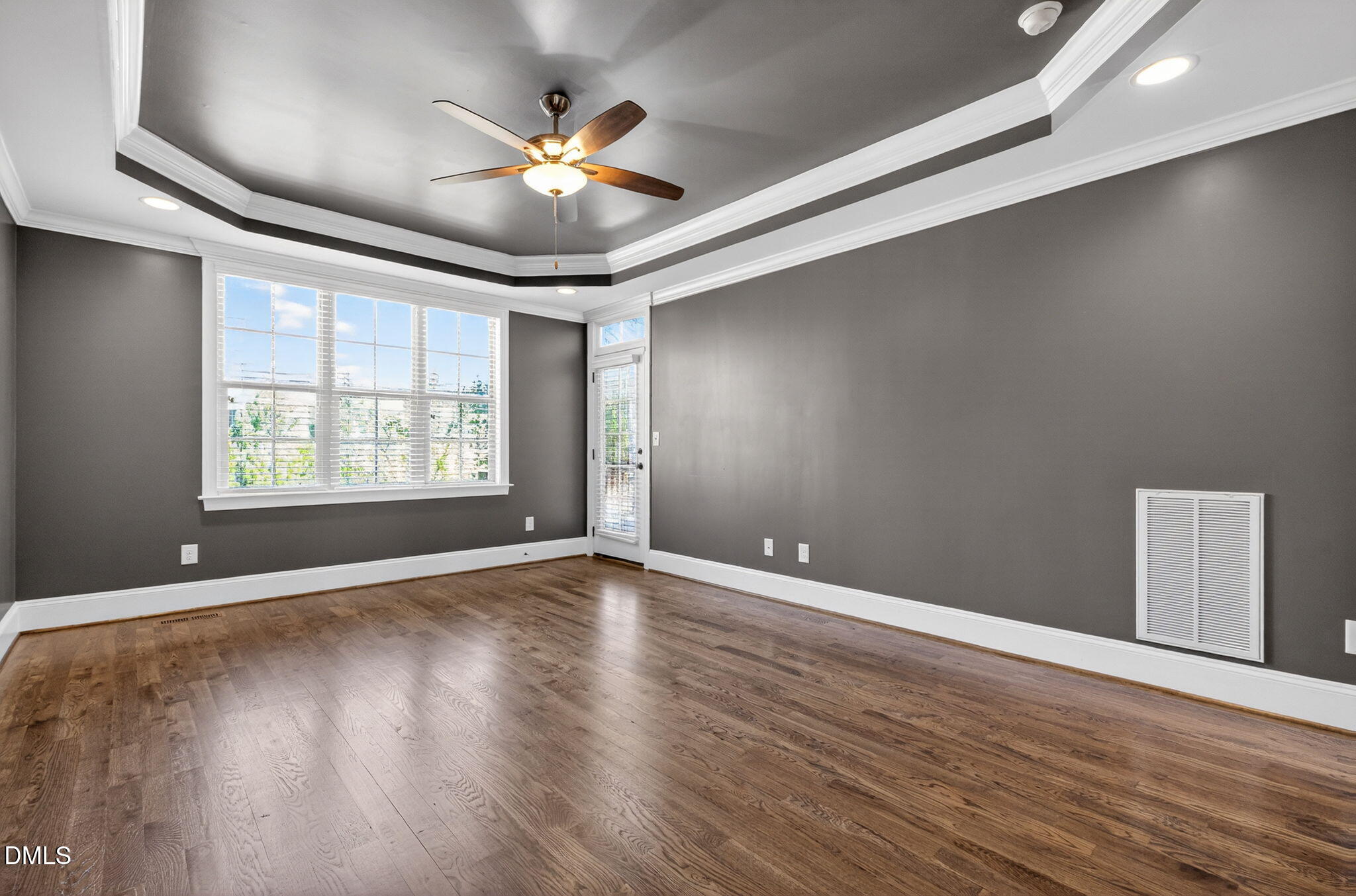 2700 Eastern Star Circle Rolesville, NC 27571 - Photo 22 of 75 an empty room with wooden floor and windows