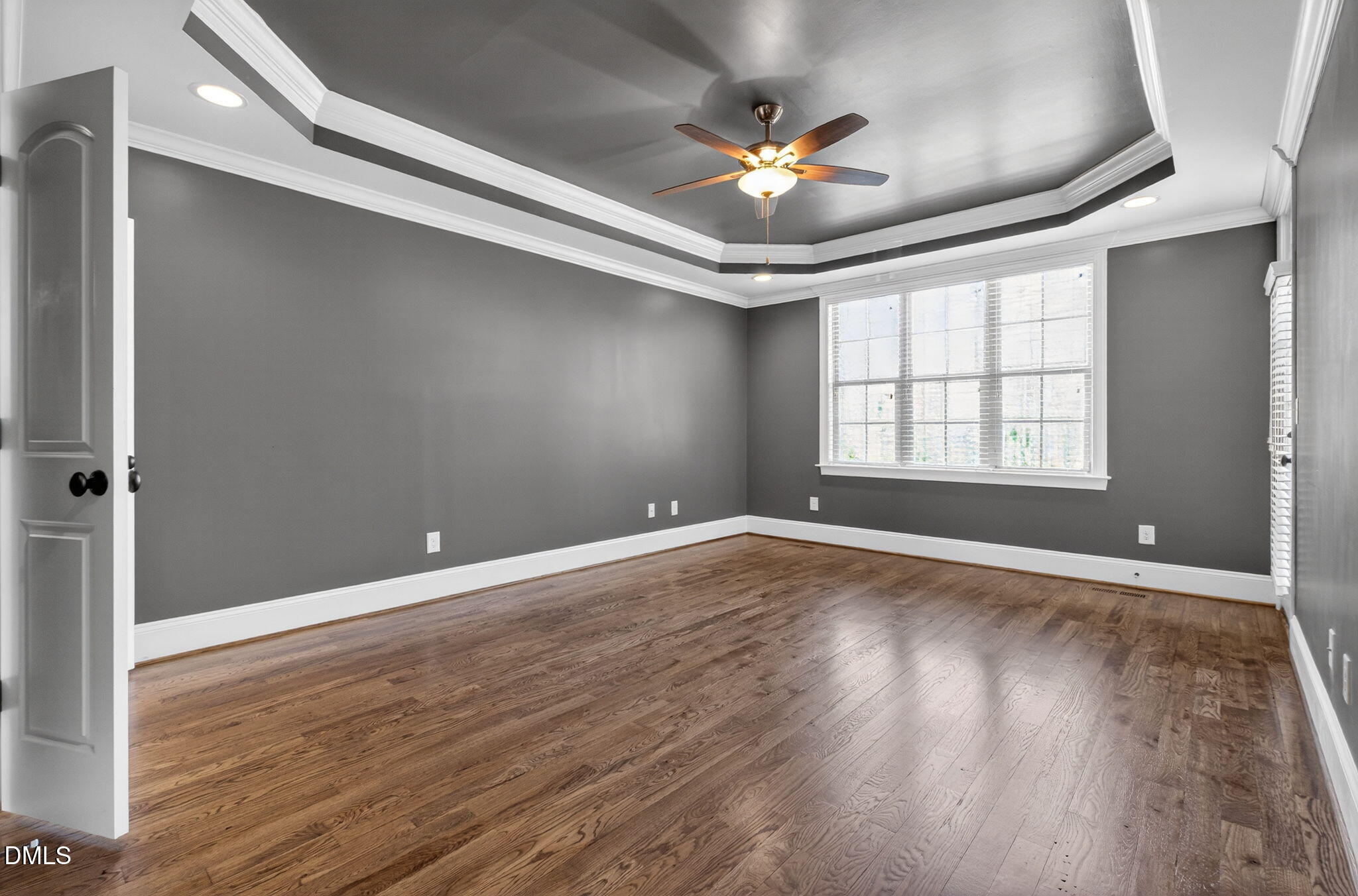 2700 Eastern Star Circle Rolesville, NC 27571 - Photo 24 of 75 wooden floor in an empty room with a window