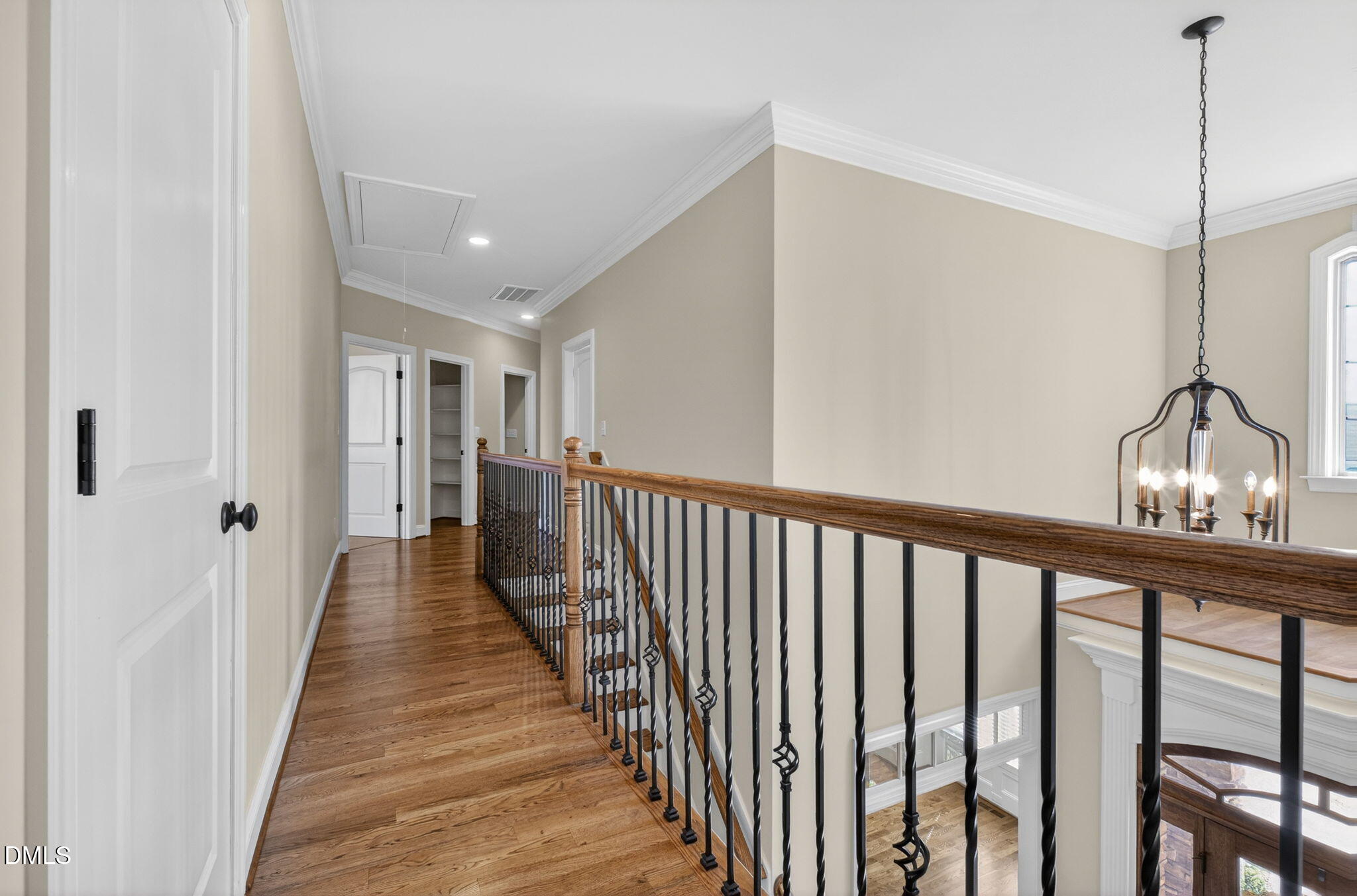2700 Eastern Star Circle Rolesville, NC 27571 - Photo 42 of 75 a view of a hallway with wooden floor and stairs
